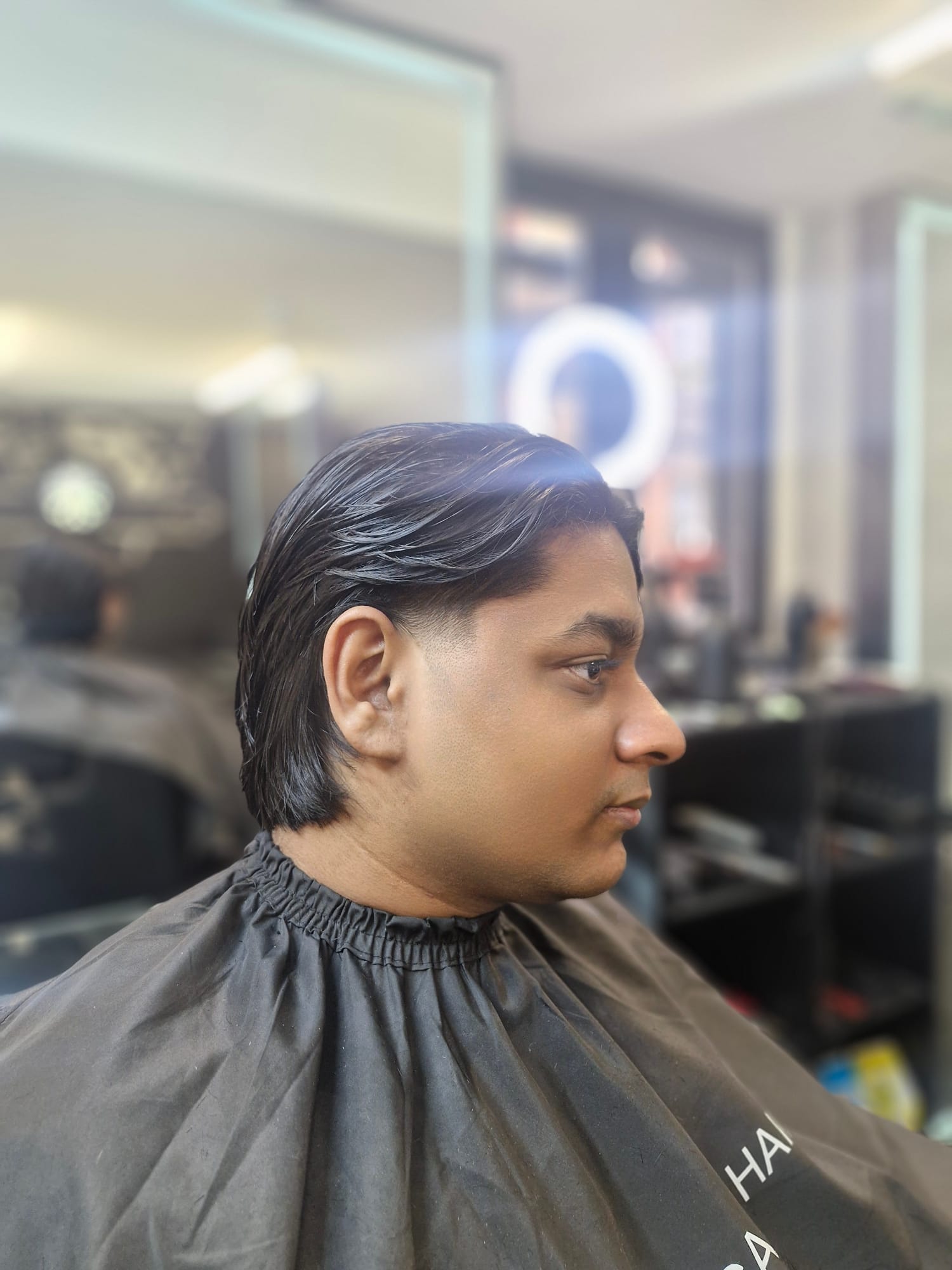 Slicked back scissor cut