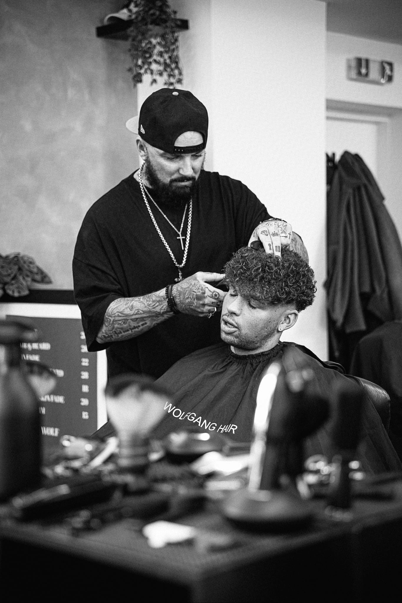 Black and white portrait of barbering at Wolfgang Hair Leicester